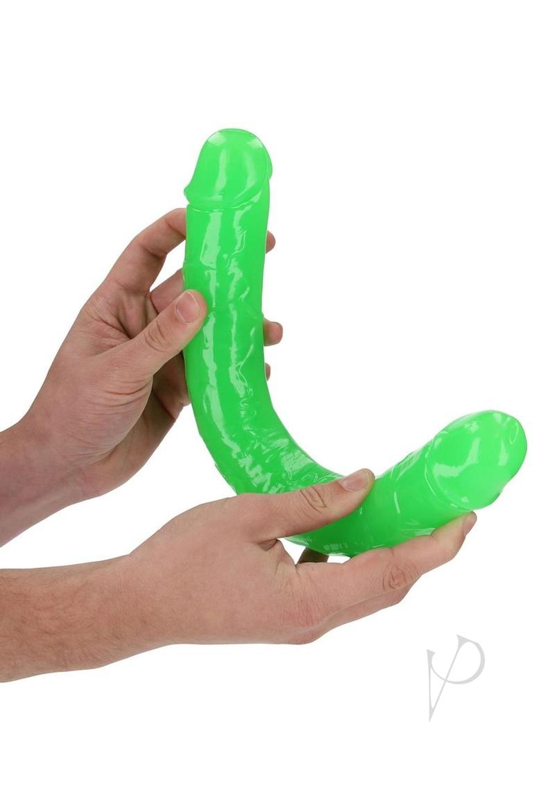RealRock Double Dong Glow in the Dark Dildo 15 inch Green held in hands with a vibrant glow.