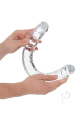 RealRock Crystal Clear Double Dong 18 inch Clear being held, showcasing its transparent design and dual ends.