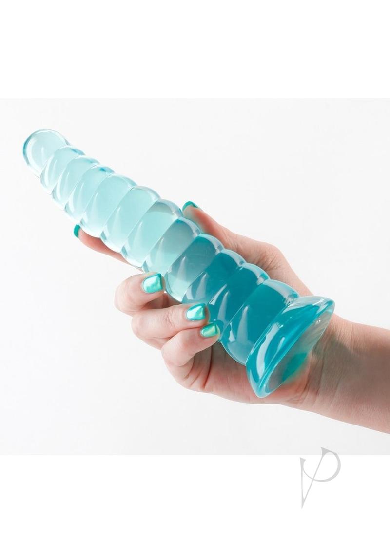 Fantasia Nymph 7 Inch Non-Phallic Dildo Teal held in hand with teal nail polish.