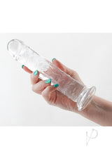 Fantasia Upper Dildo 8 inch Clear held in hand, showcasing its smooth, crystal-clear design.