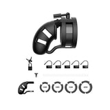 Mancage Model 18 Chastity 3.5 inch Silicone Cage Ballsplitter Black with accessories, lock and sizing rings arranged.
