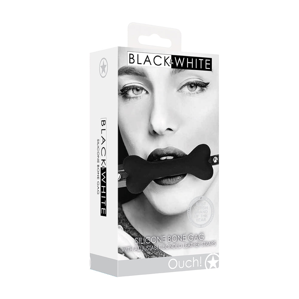 Ouch Silicone Bone Gag with Bonded Leather Straps packaging featuring a model using the gag for playful restraint.