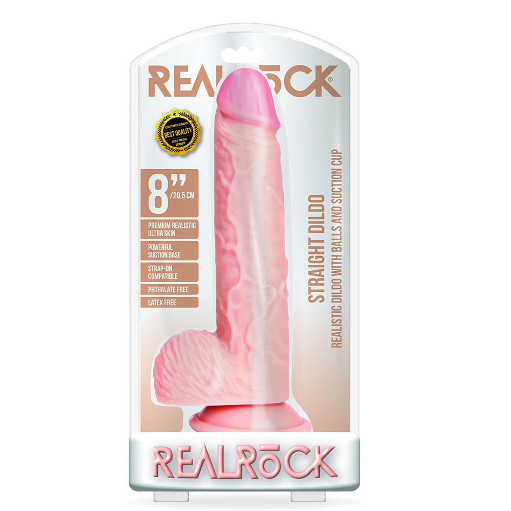 RealRock 8 Inch Realistic Dildo With Balls Suction Cup Flesh in packaging showcasing its realistic design and suction base.