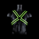 Ouch Cross Harness Glow In The Dark S M showcasing fluorescent straps on a mannequin against a dark background.