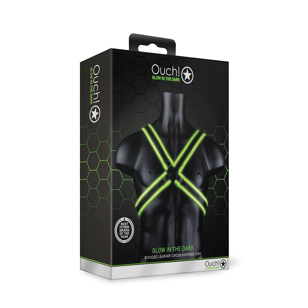 Ouch Cross Harness Glow In The Dark S M packaging displayed on a black background with fluorescent green straps.