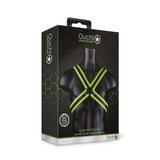Ouch Cross Harness Glow In The Dark L XL packaging showcasing the bold bondage-inspired design and fluorescent details.