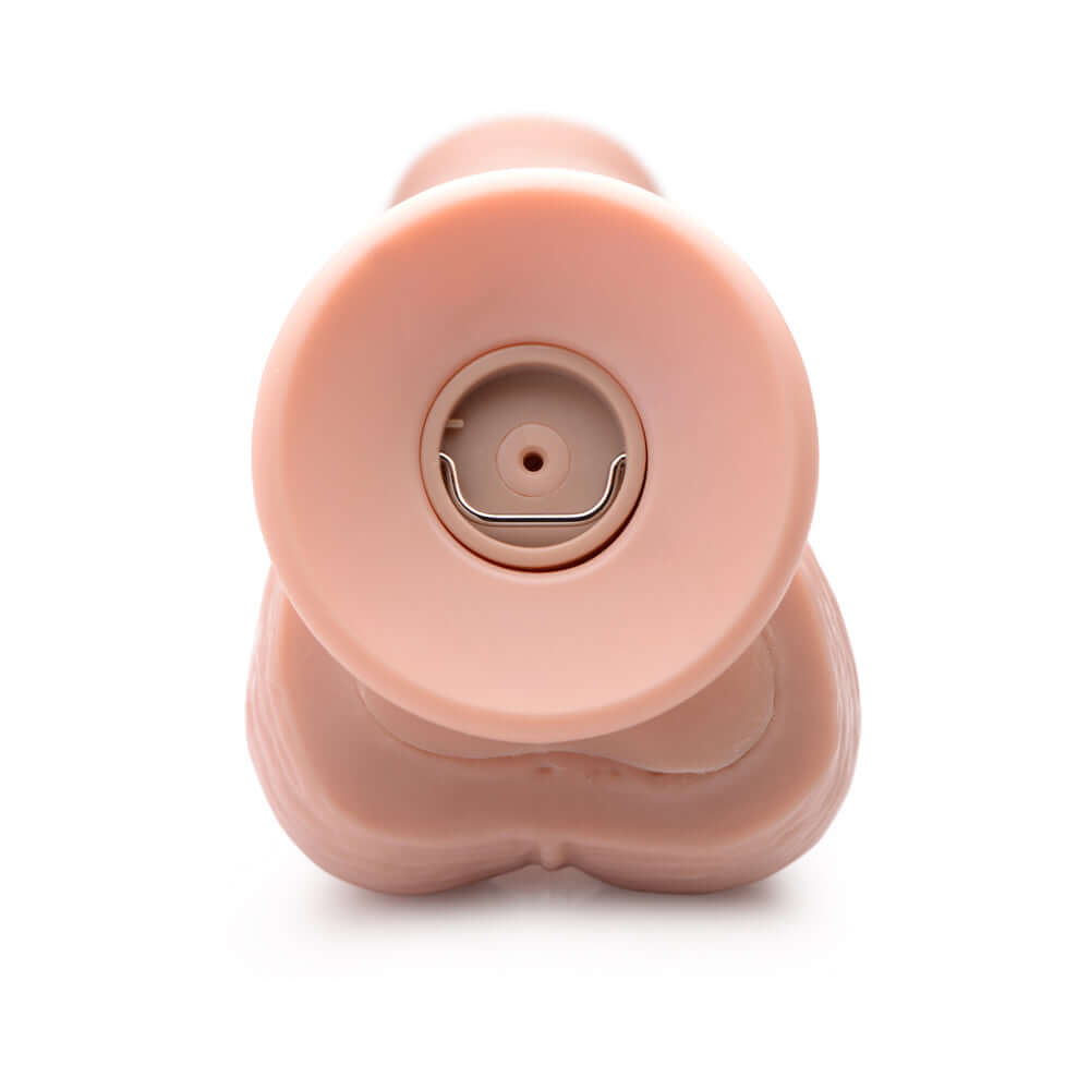 Loadz 7 inches Vibrating Squirting Dildo Light showing the base with a clear view of the power button.