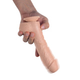 Loadz 7 inches Vibrating Squirting Dildo Light held in hand, showcasing realistic design and functionality.