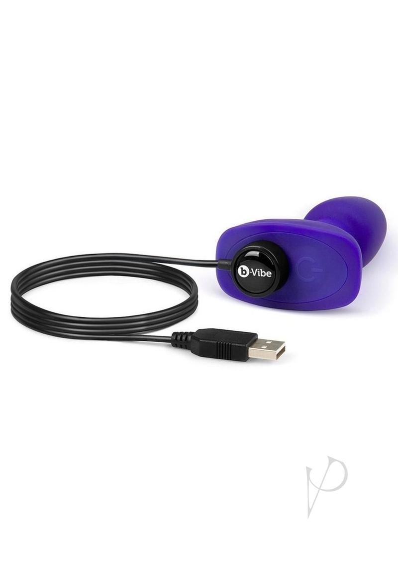 B-Vibe Rimming Petite Remote Control Anal Plug Purple with USB charging cable, ideal for anal play.