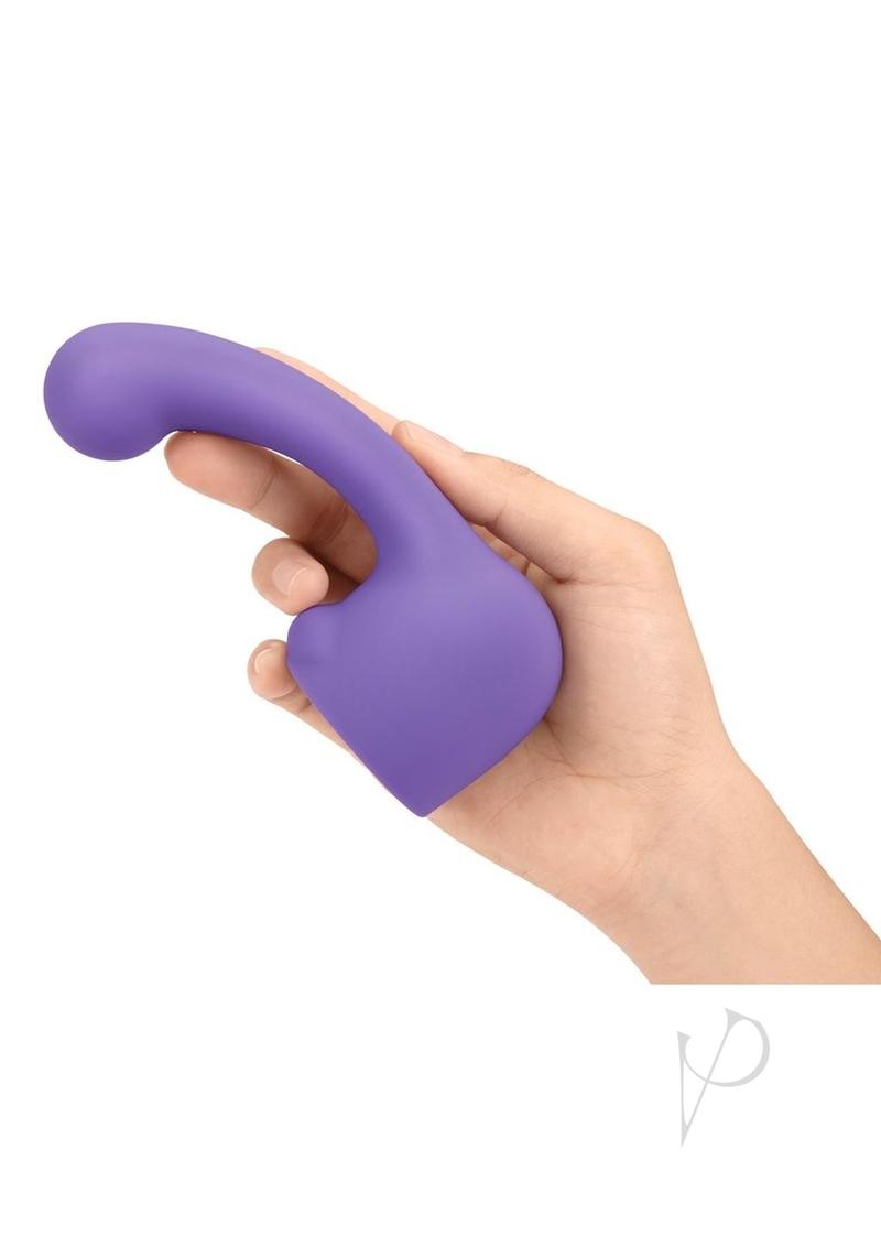 Le Wand Petite Curve Silicone Attachment Cover Violet held in a hand, designed for targeted internal pleasure.