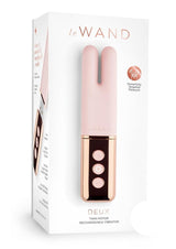 Le Wand Deux Silicone Clitoral Vibrator Rose Gold packaging showcasing elegant design and user-friendly controls.