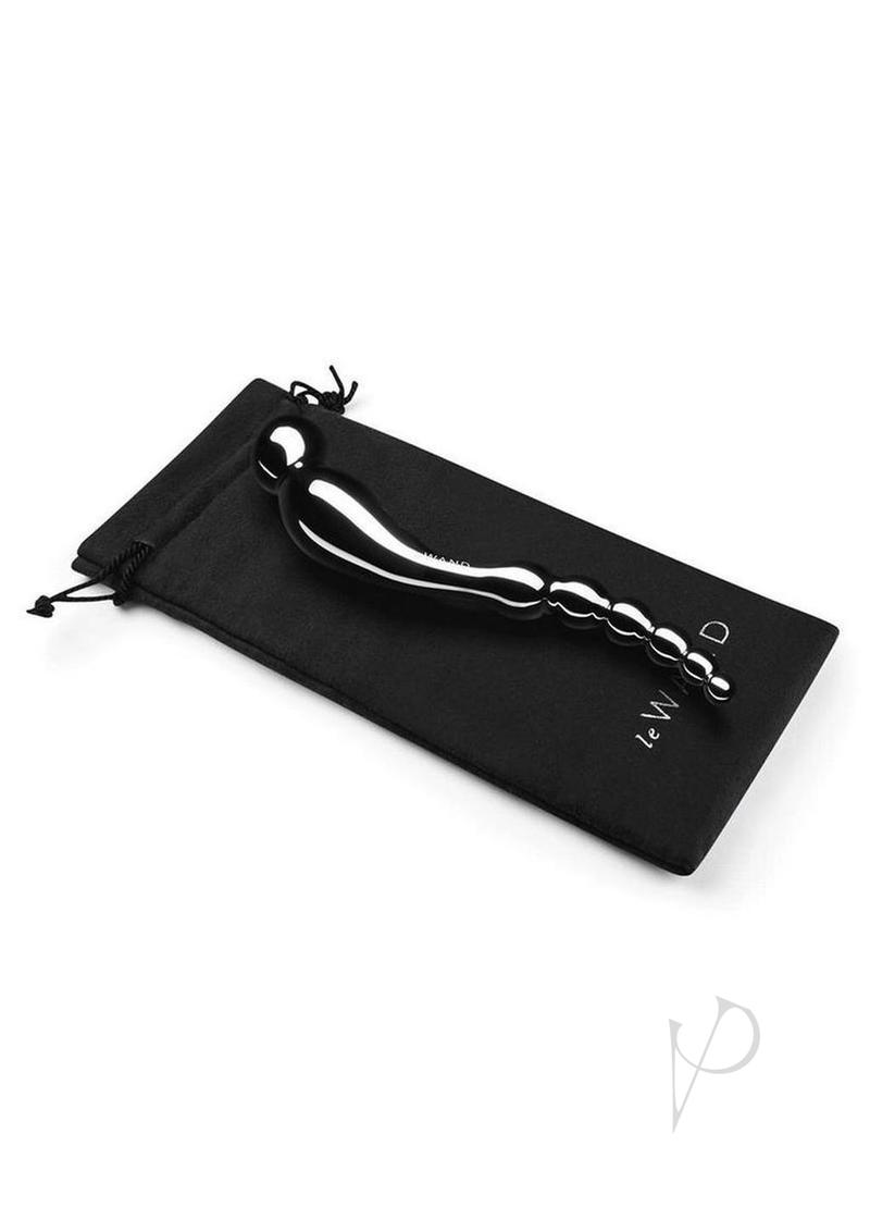 Le Wand Swerve Dual End Probe Stainless Steel resting on a black pouch, showcasing its elegant design.