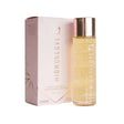 HighOnLove Massage Oil Strawberries & Champagne bottle and packaging on display.