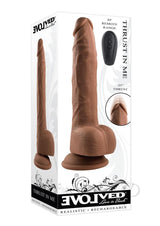 Thrust In Me Silicone Thrusting Realistic Dong Chocolate packaging with realistic design and remote control features.