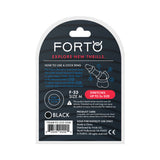 Forto F-33 Liquid Silicone Cockring Medium Black packaging with usage instructions and product details.