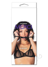 Merci Silicone Play Cuffs Black packaging featuring a model holding the cuffs, ideal for playful restraint.