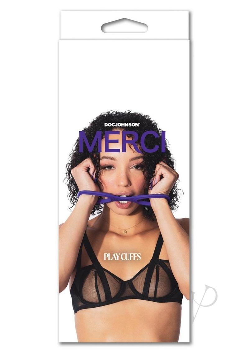 Merci Silicone Play Cuffs Purple packaging featuring a model showcasing the cuffs in a stylish setting.