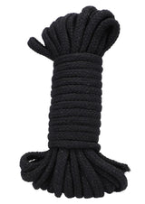 In A Bag Cotton Bondage Rope 32 Feet Black rolled neatly, perfect for restraint play and made from soft cotton.