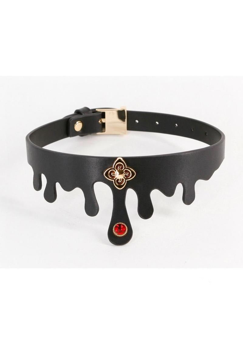 Fetish & Fashion Elvira Collar Black Gold with a ruby jewel and gold charm, designed for alluring bondage.