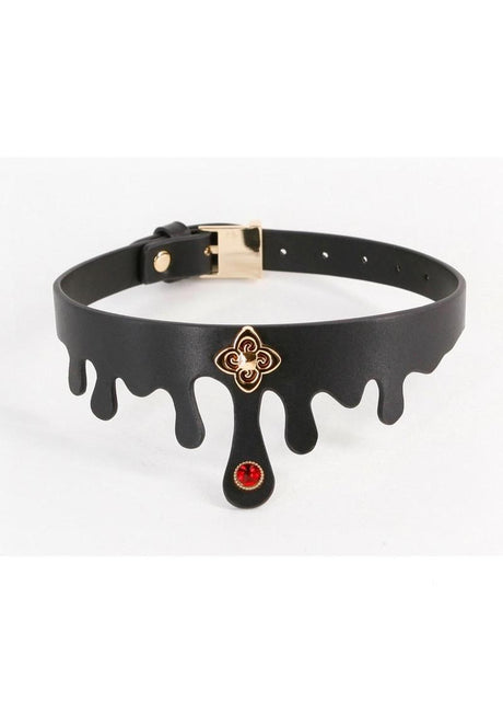 Fetish & Fashion Elvira Collar Black Gold with a ruby jewel and gold charm, designed for alluring bondage.