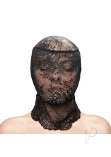 Fetish and Fashion Lace Hood Black displayed on a model, showcasing its sensual design and intricate lace patterns.