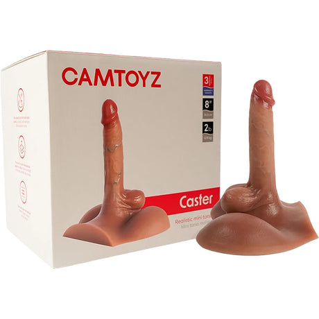 Camtoyz Caster Realistic Torso Dildo with Balls displayed next to its packaging, showcasing detail and design.