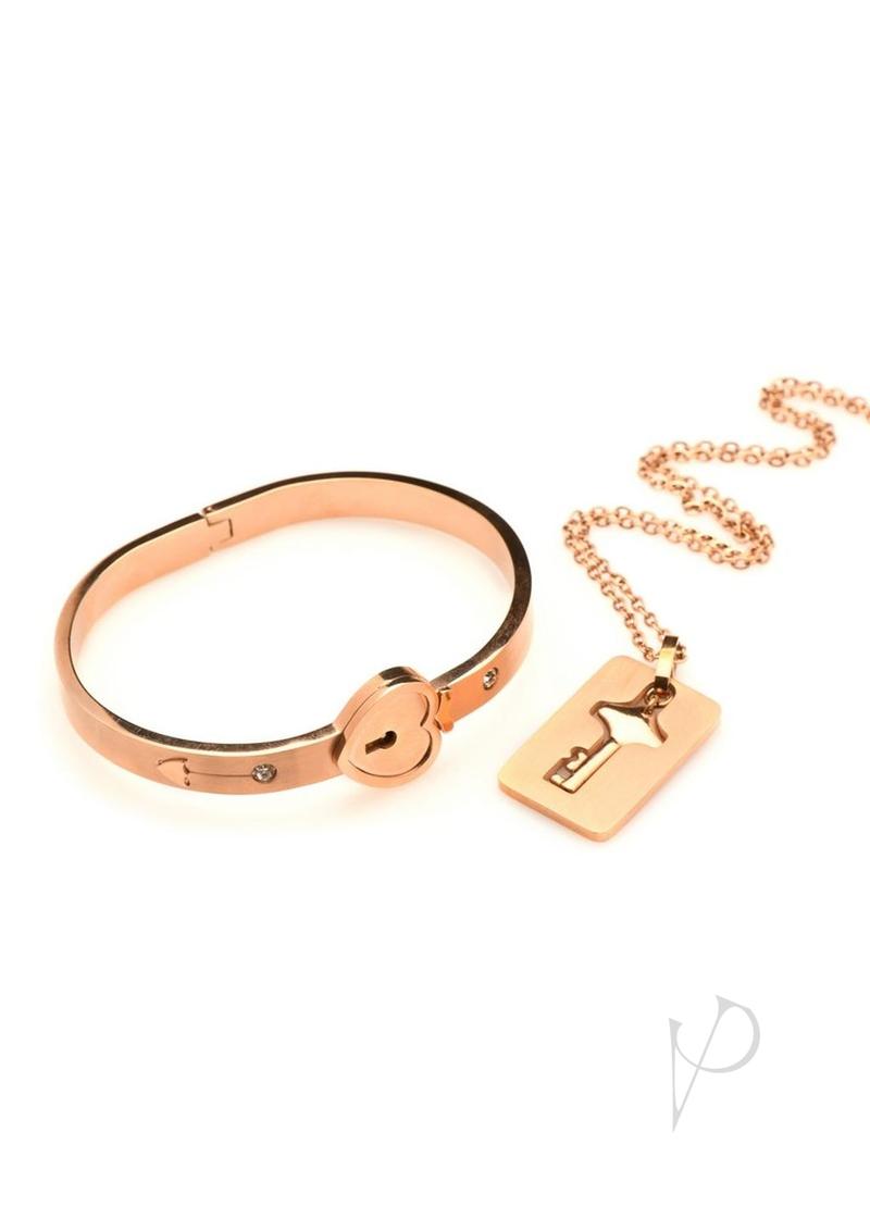 Master Series Locking Bracelet and Key Necklace Rose Gold set featuring heart-shaped cuff and key necklace.
