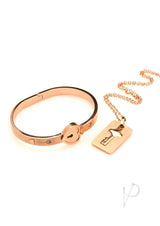 Master Series Locking Bracelet and Key Necklace Rose Gold set featuring heart-shaped cuff and key necklace.