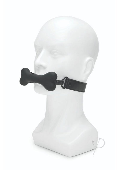 Prowler RED Bone Shaped Silicone Ball Gag Black displayed on a mannequin head for restraint play.