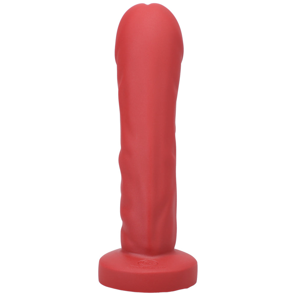 Tantus Grind Silicone Dildo True Blood Red offering a lifelike sensation and satisfying fullness for pleasure.