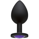 Booty Bling Jeweled Silicone Anal Plug Large Purple features sleek black silicone and a stunning purple gem design.