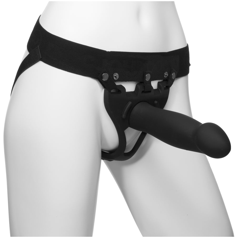 Body Extensions Be Bold Silicone Harness 8 inch Dong Black displayed on a mannequin showcasing its comfortable wear.