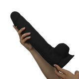 Silex-d The Original Model 1 Dildo 15 inches Black held in a hand, showcasing its length and dual-density silicone design.