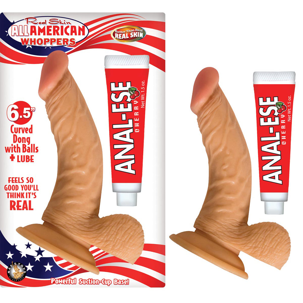 All American Whoppers 6.5 inch Curved Dong Flesh packaged with lube, featuring a realistic skin texture and suction cup base.