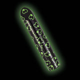 Nasstoys Glow Vibes Sweet Heart Vibrator Black with heart patterns and glowing effect on a dark background.