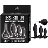 Ass-sation 3 In 1 Anal Training Kit Black with three silicone butt plugs and a douche for backdoor play.