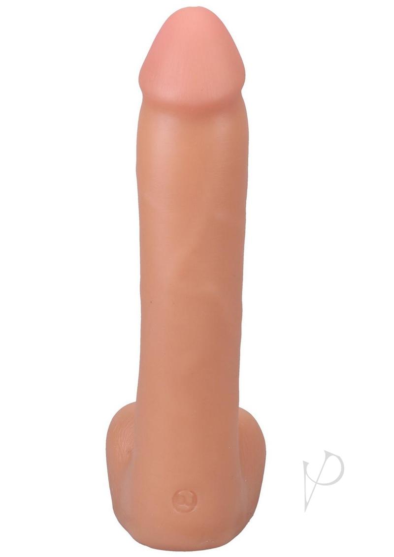 The Realistic Cock 9 inch Ultraskyn Dong Vanilla showcasing lifelike detail and soft material for pleasure.