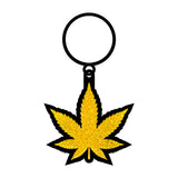Wood Rocket Gold Glitter Leaf Keychain featuring a shiny gold glitter leaf design.