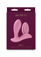Secrets Rain Silicone Remote Control Vibrator Pink in packaging, showcasing a sleek design and remote control for pleasure.