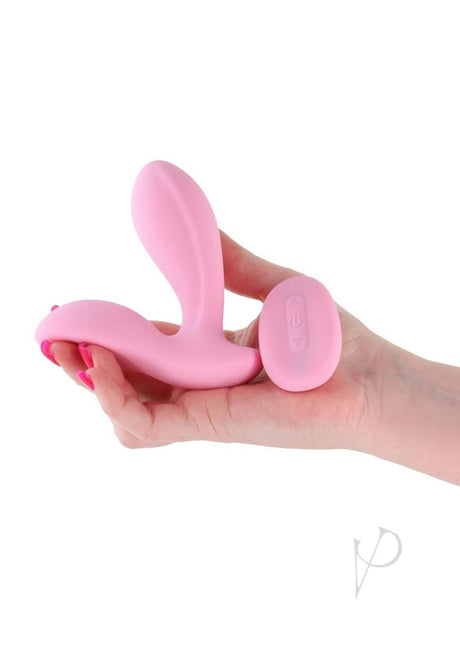 Secrets Rain Silicone Remote Control Vibrator Pink held in a hand, showcasing its sleek design and remote control.