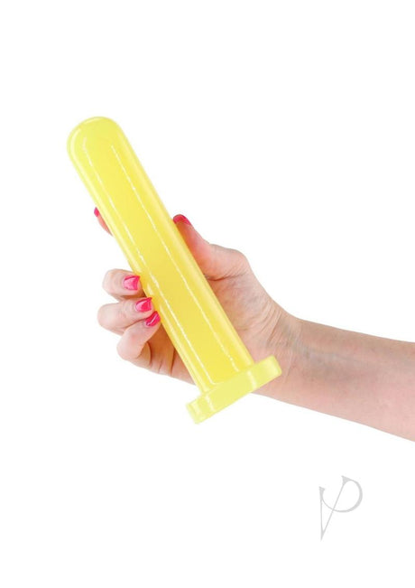 Firefly Thrill Glow in The Dark Dildo Large Yellow held in hand with vibrant yellow color.
