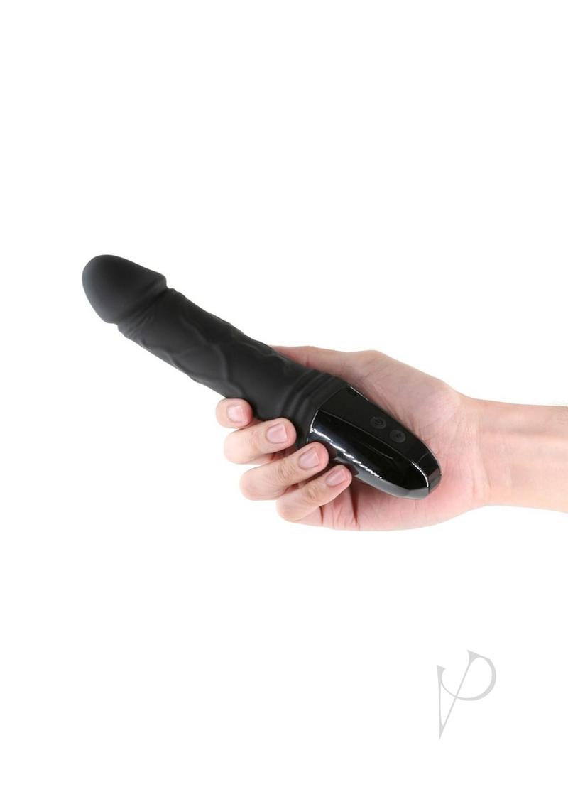Renegade Electrica Rechargeable Silicone Vibrator Black held in hand showcasing its sleek design and digital controls.