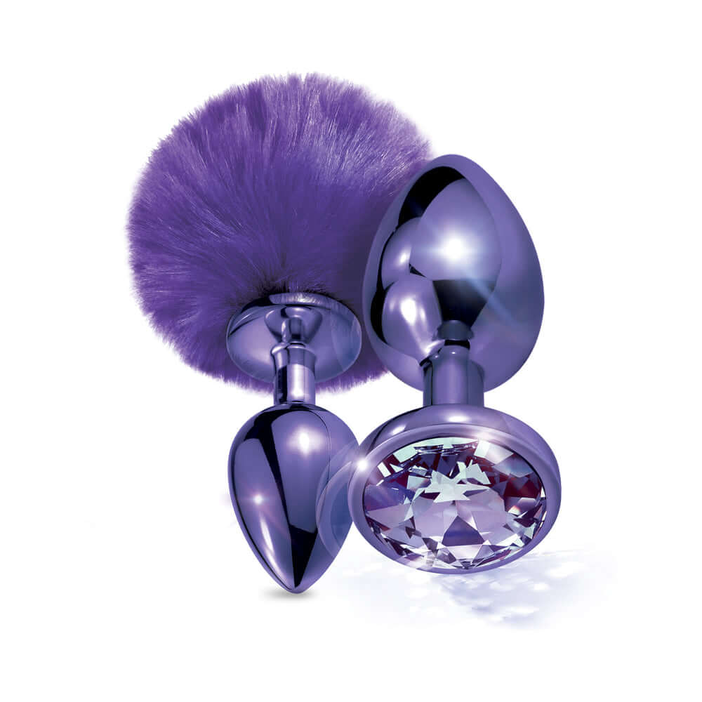 NIXIE Metal Butt Plug Set Pom Pom & Jewel-Inlaid Purple featuring polished stainless steel and elegant design.