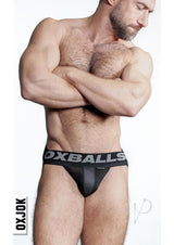 Man wearing Oxballs Airmesh Swagger Jockstrap Black XXLarge showing comfort and support in a sleek design.