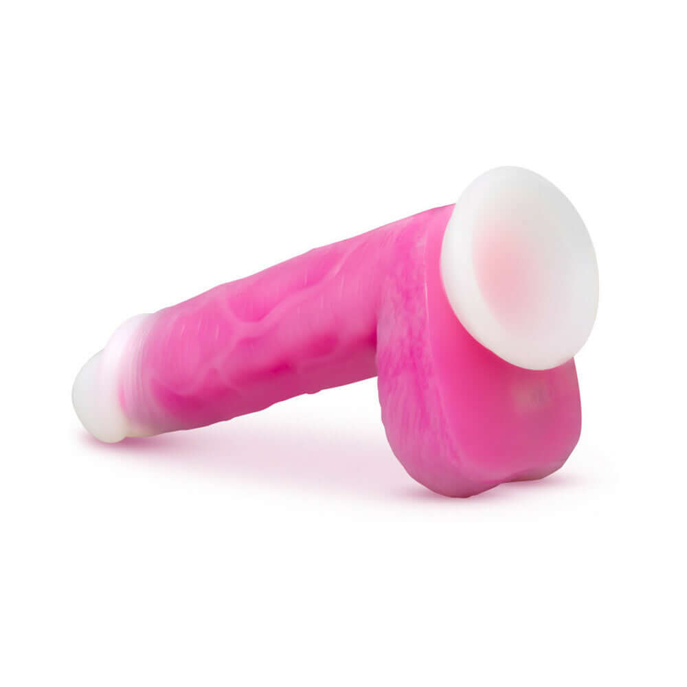 Neo Elite Roxy 8 inch Silicone Gyrating Dildo with Balls Pink in a realistic shape, showcasing smooth silicone textures.