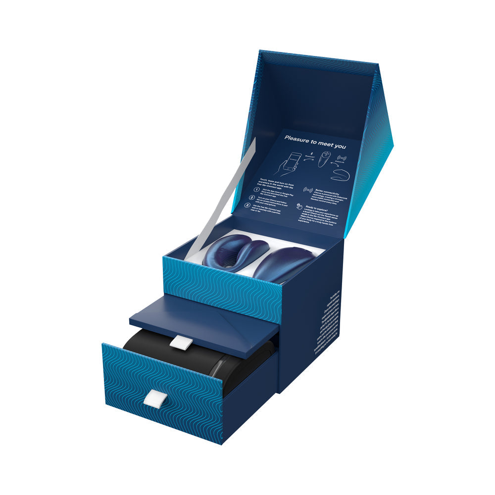We-Vibe Chorus Couples Massager Cosmic Blue packaging with instructions and design details opened