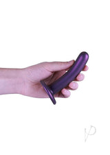 Ouch Smooth G-Spot Silicone Dildo 5 Inch Metallic Purple held in hand for G-spot stimulation.