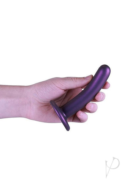 Ouch Smooth G-Spot Silicone Dildo 5 Inch Metallic Purple held in hand for G-spot stimulation.