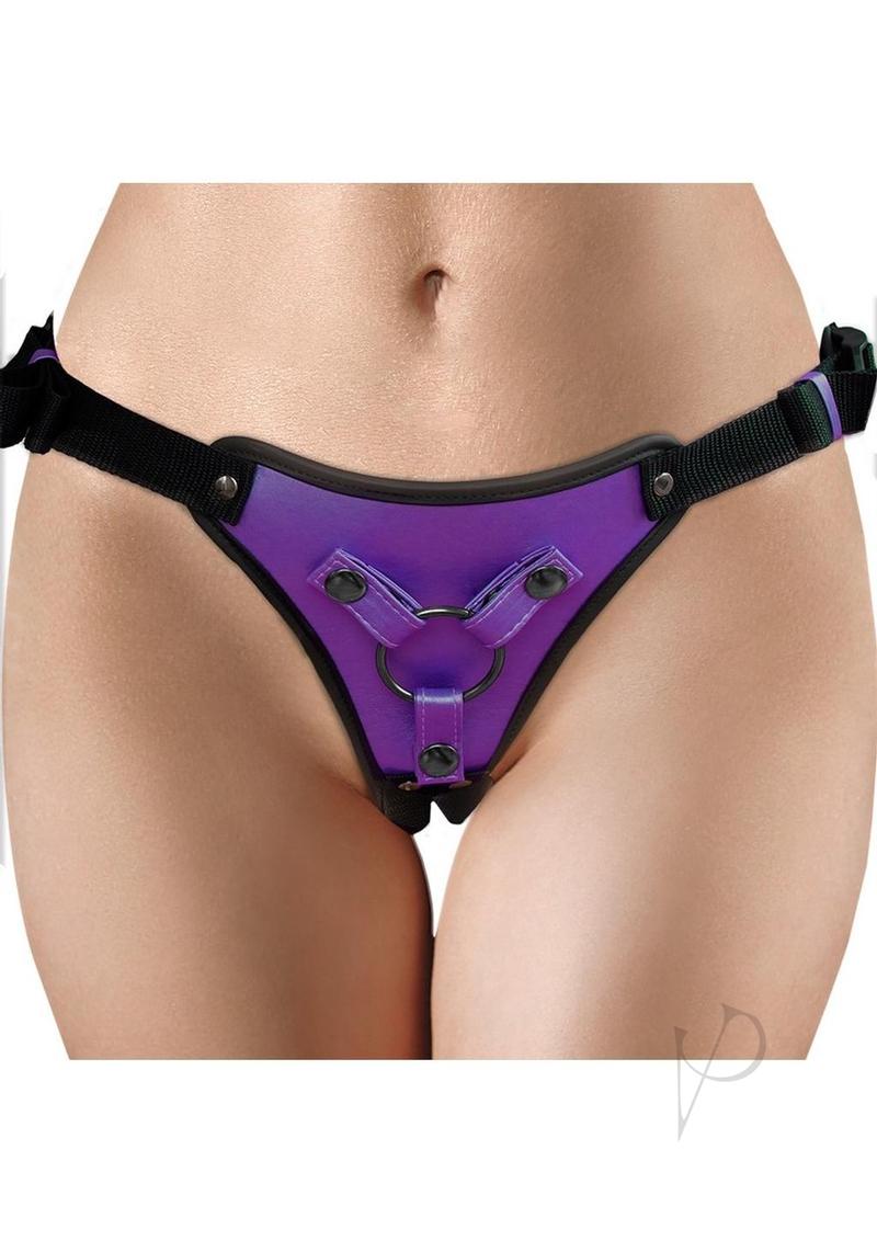 Ouch Strap-On Harness Metallic Purple displayed on a model, showcasing sleek design and adjustable straps.