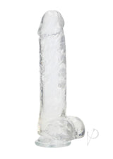 RealRock Crystal Clear Realistic Dildo with Balls 10 inch featuring a transparent design and sturdy suction cup base.